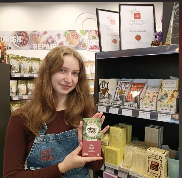 Jess holding Alter Eco Sea Salt 70% cacao chocolate