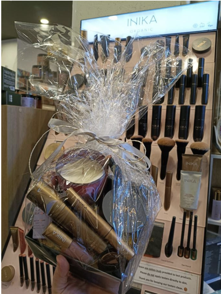 Inika Organic skincare and makeup hamper wrapped as the August giveaway prize
