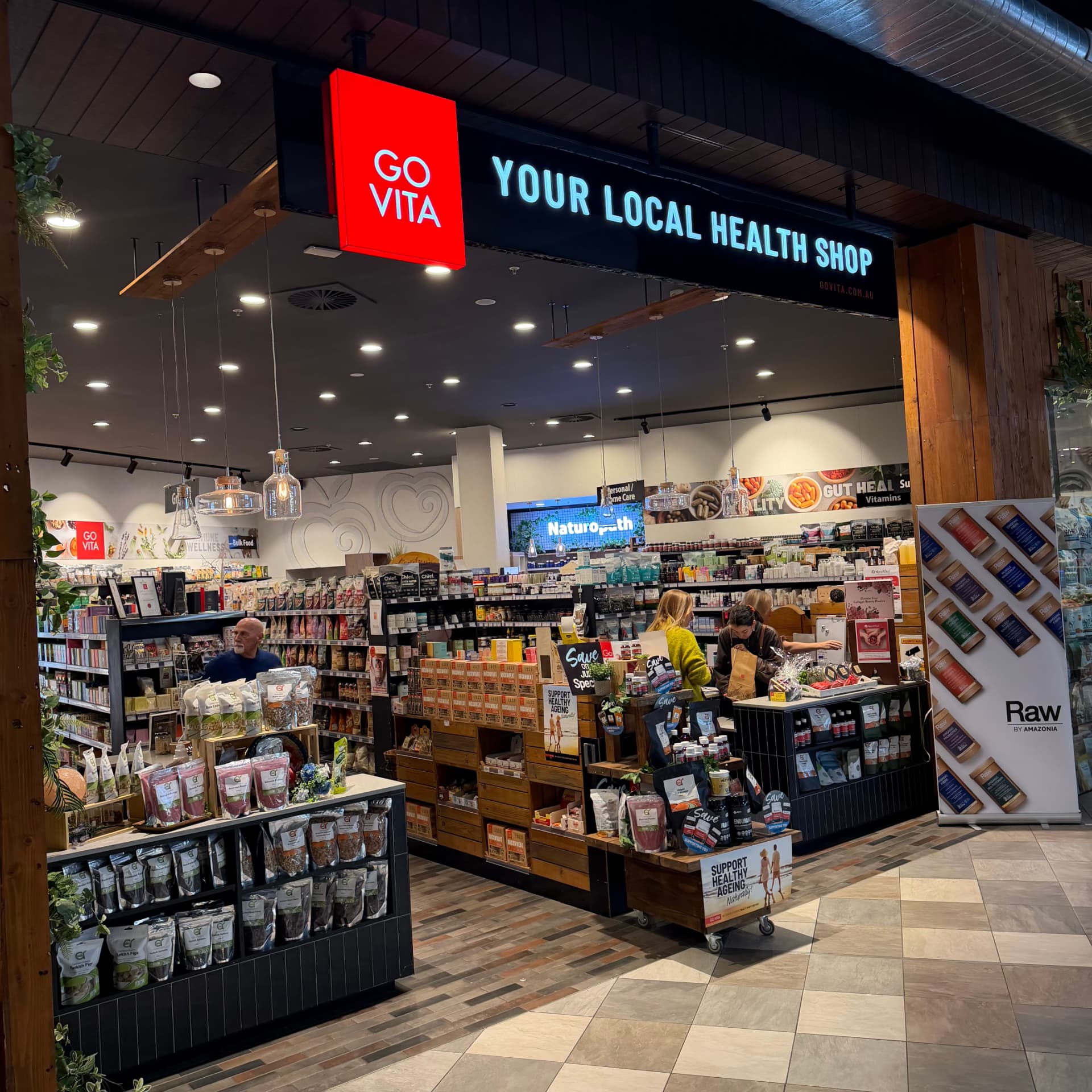 Go Vita Midland shopfront at Midland Gate with café counter and 'Your Local Health Shop' sign